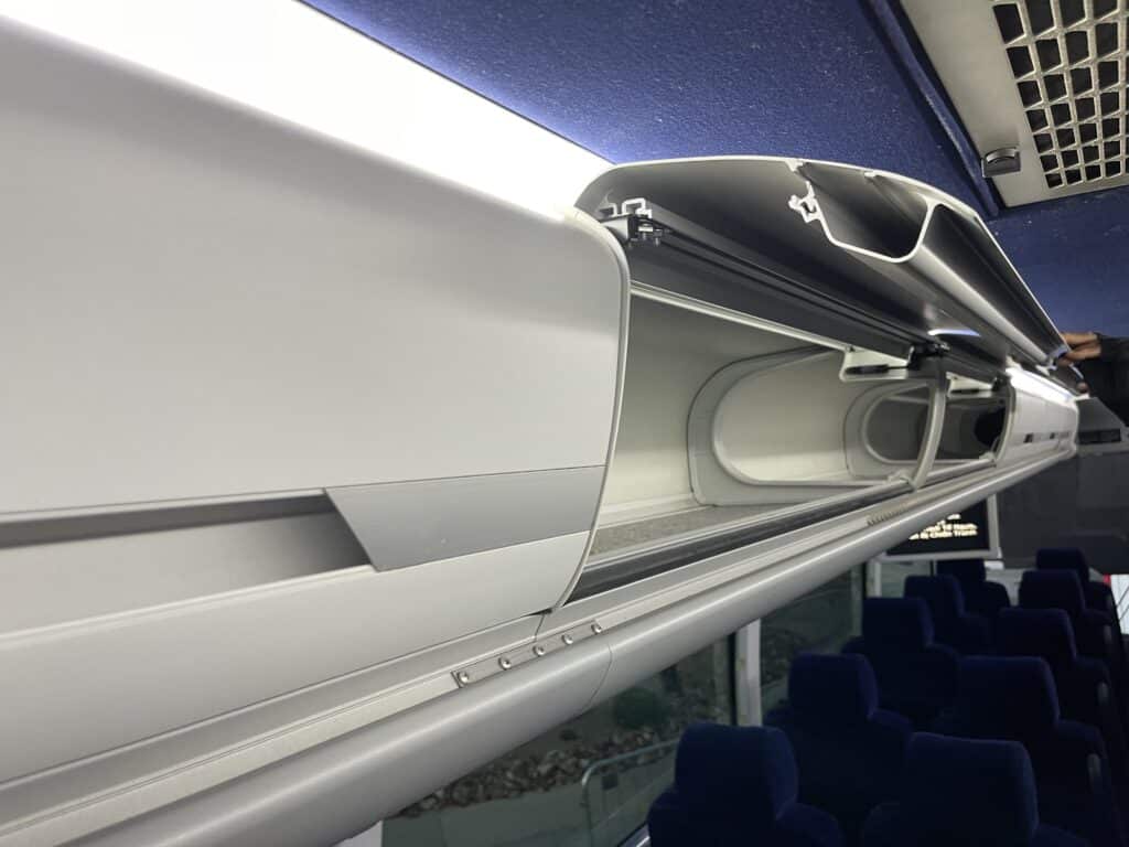 Overhead storage on a charter bus